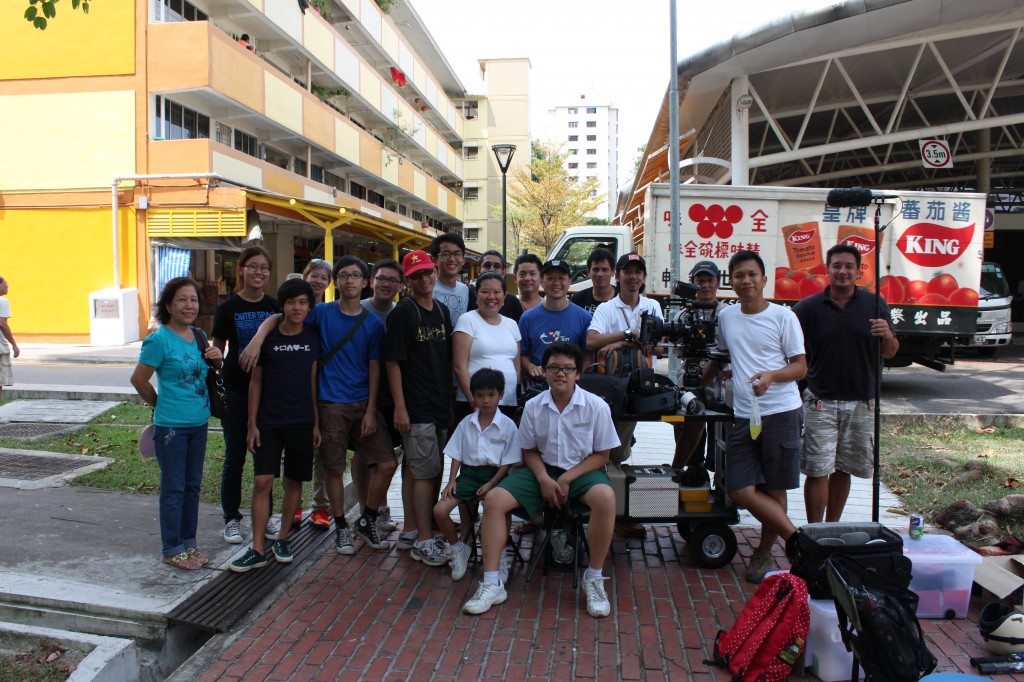 CUTAWAY: Michael Kam with his crew on the set of Detour.